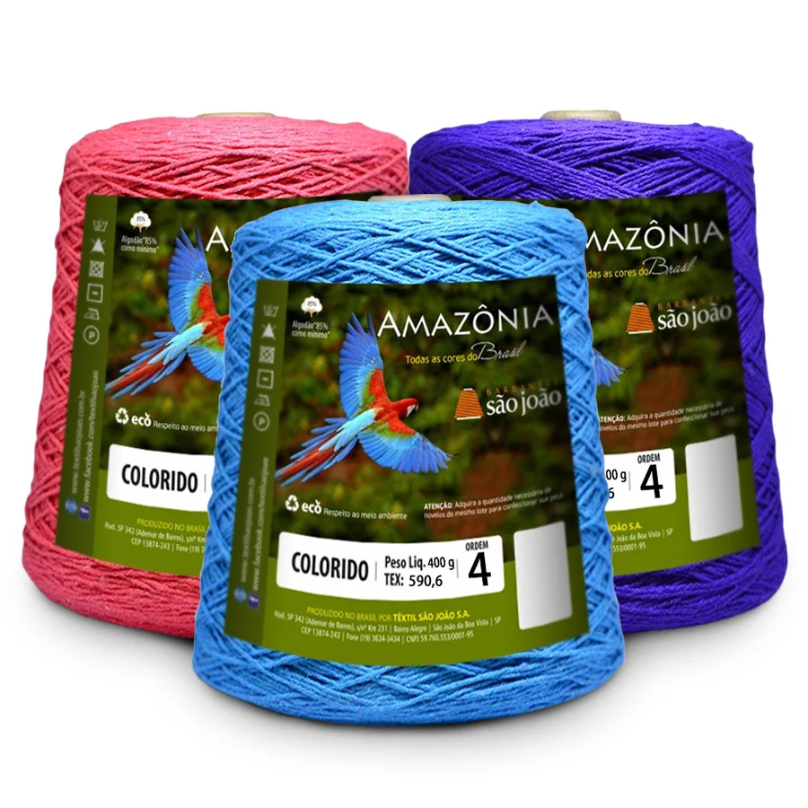 Três cones de Barbante Amazônia São João nas cores pink, azul e violeta, com rótulo verde mostrando a arara e a marca AMAZÔNIA